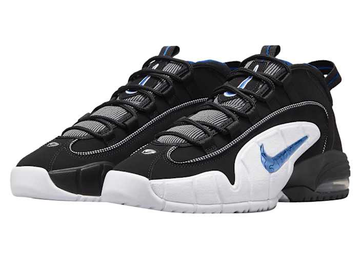 View of black and white Nike Air Penny shoes.